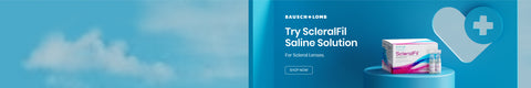 Advertisement for Bausch + Lomb’s ScleralFil Saline Solution for scleral lenses. The ad features a product box and vials on a blue surface, with a large heart icon containing a medical cross in the background. Text includes Try ScleralFil Saline Solution.