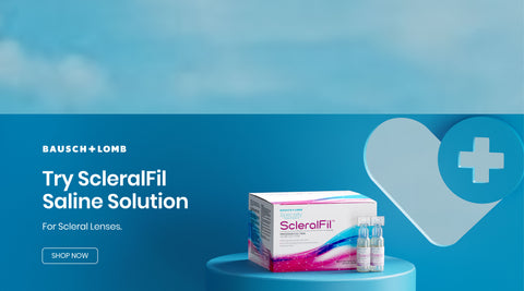 Packaging of Bausch + Lomb ScleralFil Saline Solution is displayed against a blue background. Next to it is a heart icon with a plus sign. Text reads: Try ScleralFil Saline Solution for scleral lenses. A Shop Now button is visible.