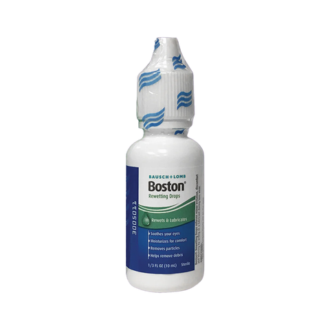 The 0.33 fl oz Boston Rewetting Eye Drops by Bausch + Lomb comes in a small white bottle with a blue and white label and tamper-evident seal, enhancing wettability, soothing eyes, and removing particles for rigid gas permeable contact lens users.