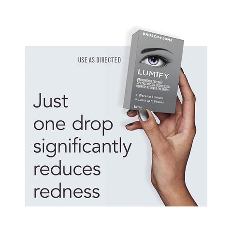 A hand holds a box of Bausch + Lomb Lumify Eye Drops (2.5mL or 7.5mL, 1 or 3 Month Supplies). Text: Just one drop reduces redness in 1 minute and lasts up to 8 hours with brimonidine. Use as directed.