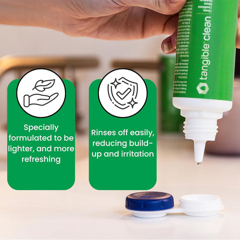 Close-up of a person using Tangible Clean Multi-Purpose Solution from a green bottle into a blue and white lens case. Text on green circles states Specially formulated to be lighter and more refreshing and Rinses off easily, reducing build-up and irritation. Ideal for Hydra-PEG lenses.