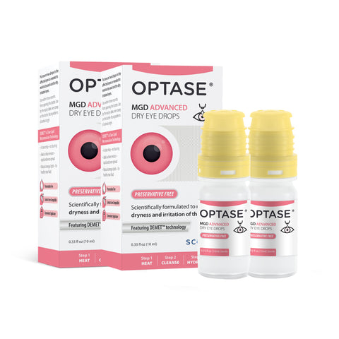 Two boxes and two yellow-capped bottles of Optase MGD 2-pack Advanced Eye Drops, designed for Meibomian Gland Dysfunction, feature a white and red palette with a pink circle. This preservative-free product offers a 3+ month supply (600 drops).