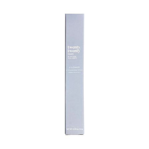 A tall, sleek, light blue box with Twenty Twenty in white contains the Visionary Eye Shadow Stick - Quartz Purple. Designed with eye-safe ingredients for those concerned about dry eye disease, it weighs 0.05 oz / 1.5 g and is oil-based without flakes.