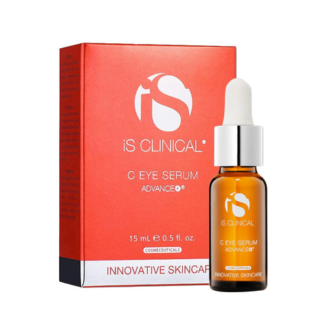 An orange bottle of iS Clinical C Eye Serum Advance+ for Age-Defying and Hydrating skin (15mL 0.5 fl. oz.) stands beside its matching box, both featuring white text with the brand name and highlighting ingredients like Tripeptide-1 and L-Ascorbic Acid.