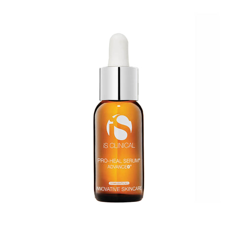 A centered brown glass dropper bottle labeled iS Clinical Pro-Heal Serum Advance+, with a white cap, provides Vitamin C benefits for sensitive skin. The label includes Innovative Skincare and is set against a pristine white background.