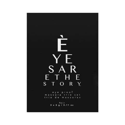 The sleek black packaging with bold white text announces ÈYE SAR ETHE STORỲ. Below, it reveals the Eye Proof Mascara Trio Set by Eyes are the Story. This set of three non-flaking mini mascaras is perfect for sensitive eyes, weighing 3 x 3g / 0.11 oz.