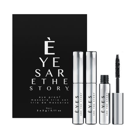 A black box labeled Eyes are the Story contains three silver Eye Proof Mascara Trio tubes for sensitive eyes. One open tube shows a black wand, promising a flake-free experience. The box reads Noir 3 x 3g / 0.11 oz.