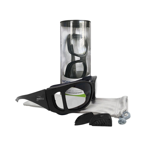 The EyeEco Large Moisture Release Eyewear by PRN in matte black with clear lens includes a protective case, a microfiber bag, and additional inserts. It features removable foam gaskets to alleviate dry eyes, with sleek packaging shown in the background.