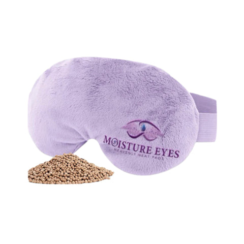 The lavender-colored Moisture Eyes Heavenly Heat Pads by Dry Eye Guys features an eye logo. This soft, plush eye mask uses clay bead technology for soothing heat, promising ultimate eye discomfort relief with a small pile of beige round beads as its filling.