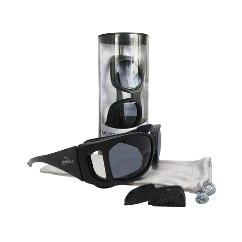 Displayed in front of a cylindrical case, the EyeEco Small Moisture Release Eyewear (Matte Black with Gray Lens) by PRN comes with a white drawstring pouch, small black accessories, an anti-fog coating, and a microfiber cleaning bag.