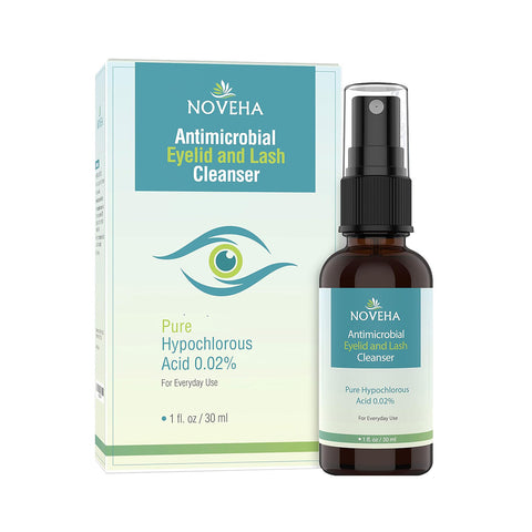 The Noveha Hypochlorous Acid Eyelid and Lash Cleanser (30mL) features a green and white box with a blue eye design, alongside a 1 fl. oz. spray bottle highlighting its Pure Hypochlorous Acid 0.02% formula, designed for eyelid hygiene and blepharitis relief.