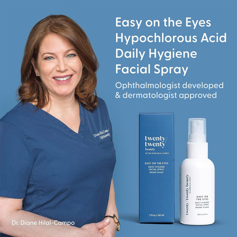 A woman in blue scrubs smiles beside a product, embodying trust and care. The image displays a box and bottle labeled Twenty Twenty, featuring the Daily Hygiene Facial Spray (Hypochlorous Spray) (60ml), which is proudly ophthalmologist- and dermatologist-approved for your skins daily needs.