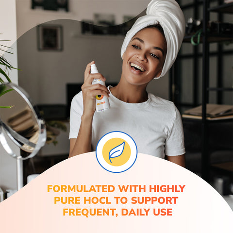 A person with a towel on their head smiles while holding Optase Protect Eyelid Hypochlorous Cleansing Spray (100ml). Text reads, FORMULATED WITH HIGHLY PURE HOCL TO SUPPORT FREQUENT, DAILY USE with a leaf icon above it. Perfect for daily eye hygiene.