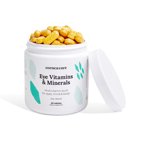 Open white CorneaCare Multivitamin for Eyes, Mind and Body container with teal design spills yellow tablets. The label emphasizes its benefits for eye health, mind, and body. Features 60 dietary supplement tablets. Lid is beside the container. Brand: CorneaCare.
