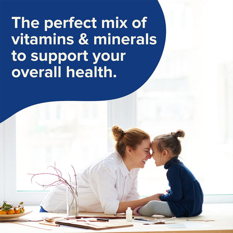 A woman and a young girl touch noses and smile in a bright room. A speech bubble reads, The perfect mix of vitamins & minerals to support your overall health. Amidst oranges and small bottles on the table, Focus Vitamins Multivitamin Gummies promise to naturally boost your energy levels.