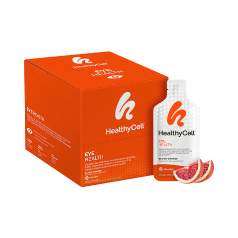 A vibrant orange box of HealthyCell Eye Health supplement, 30ct, with Lutein and Zeaxanthin for visual acuity. Blood orange flavor sachet includes antioxidant-rich supplements, accompanied by fresh slices. White text and logo decorate the packaging.