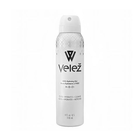 The Velez Hypochlorous (HOCL) Hydrating Mist for Face and Eyelids comes in a 4 oz (120mL) white canister featuring a black V logo and Bag-on-Valve Technology. It contains hydrating Hypochlorous Acid and is labeled with product details for ultimate freshness.