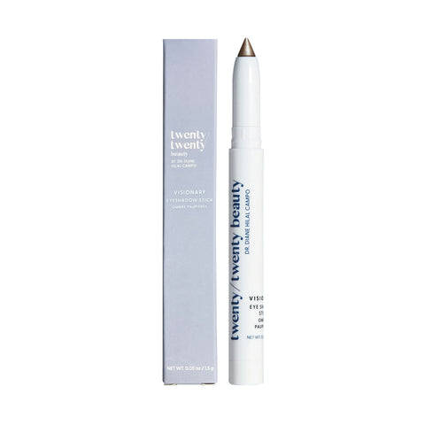The Twenty Twenty Visionary Eye Shadow Stick features a sleek white pen with a beige tip, formulated with eye-safe ingredients. Its light gray packaging and chic design ensure gentle application, perfect for those with dry eye disease.