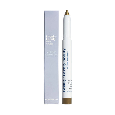 The Twenty Twenty Visionary Eye Shadow Stick is a white and gold eyeshadow, perfect for sensitive eyes. Packaged in a light purple box, it features eye-safe ingredients ideal for those with dry eye disease.