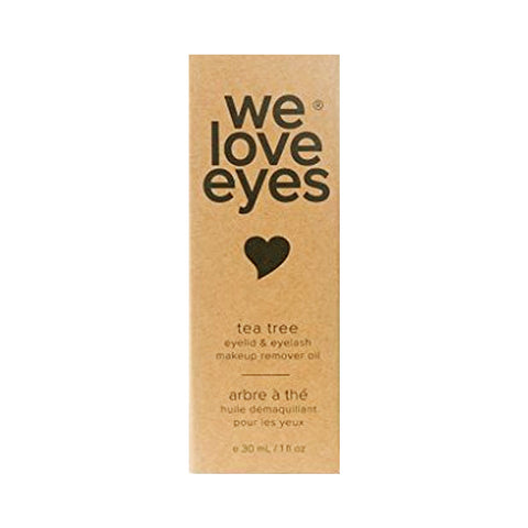 A rectangular box with We Love Eyes and a heart symbol displays tea tree eyelid & eyelash makeup remover oil, highlighting Australian Tea Tree Oil. The packaging also says arbre à thé huile démaquillant pour les yeux. Size: 30 mL / 1 fl oz.