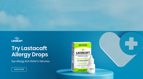 A box and a bottle of Lastacaft Allergy Drops are displayed on a blue cylindrical stand. Text reads Try Lastacaft Allergy Drops and Eye Allergy Itch Relief in Minutes with a heart and cross icon on the right. Shop Now button is visible.