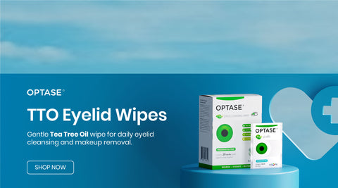 Advertisement for OPTASE TTO Eyelid Wipes. The image shows a box and a single packet of the wipes. Text highlights gentle tea tree oil for daily eyelid cleansing and makeup removal. A Shop Now button is included. Background is blue with a medical symbol.
