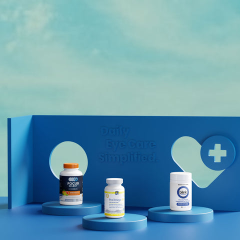 A display with three supplement bottles on blue pedestals against a blue background. Text reads Daily Eye Care Simplified. The left bottle is labeled as a focus supplement, the middle as an omega supplement, and the right as an eye health product.