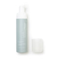 A light green, tall cylindrical bottle labeled Daily Practice features a pump dispenser and a translucent cap. The Gentle & Hydrating Purifying Foam Cleanser is ophthalmologist-developed for daily care and comes in 80 mL (2.7 fl. oz.) size, ideal for eyes and lashes.