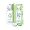 The BioTrue Multipurpose Contact Lens Solution Travel Kit (2oz 60mL) by Bausch + Lomb is displayed with its packaging, featuring two bottles and two contact lens cases, one white and one green. The package highlights the solutions hydration benefits for lenses.