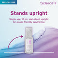 Image of a Bausch + Lomb ScleralFil saline solution vial upright, highlighting its design for people using scleral lenses. Its a single-use, preservative-free buffered saline in 10 mL (0.34 Fl Oz) vials. The soft, abstract purple and blue background enhances its user-friendly presentation.