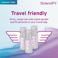 Three ScleralFil 0.34 Fl Oz vials, ideal for various lenses, are displayed with winged sides and Travel friendly text, highlighting their preservative-free saline solution. The Bausch + Lomb logo is placed at the top left on a blue and purple background.