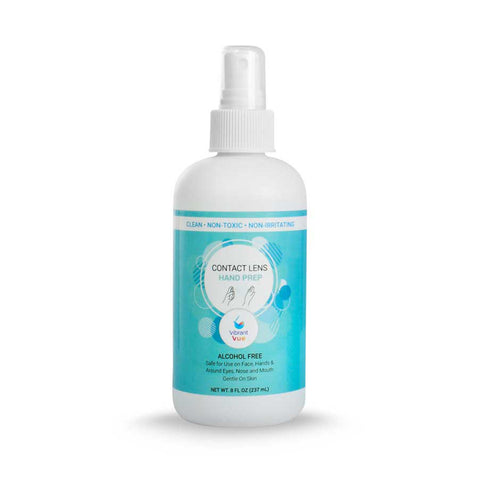 The 8 fl oz Vibrant Vue Contact Lens Hand Prep by Visionary Optics is a white spray bottle with a blue-green design stating Clean - Non-Toxic - Non-Irritating. Alcohol-free and gentle, it offers hand prepping protection with hypochlorous acid for safe contact lens handling.
