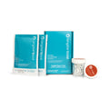 The Tangible Boost 2-Pack, designed for Tangible Hydra-PEG coated lenses, features blue and white packaging with two sachets, a box, a small round container with an orange lid, and a white lens case elegantly arranged on a pristine white background.