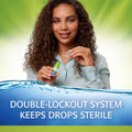A woman with curly hair in a light blue shirt holds Refresh Relieva Preservative-Free Lubricant Eye Drops (10mL Multi-Dose Bottle) by Abbvie and a cap against a green background. Text reads, DOUBLE-LOCKOUT SYSTEM KEEPS DROPS STERILE.
