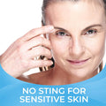 A light-skinned person gently touches their eyebrow, smiling softly against a white background. Below, text reads: Cliradex Light Foam by PRN - no sting for sensitive skin, perfect for ocular hygiene.