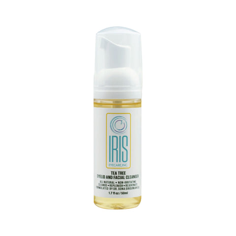 The IRIS Tea Tree Cleanser Foam for Eyelids by Iris Eyecare comes in a 50mL cylindrical bottle with a pump dispenser. Its label is mainly white with blue and gold accents, perfect for hydrating and soothing.