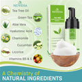 Image of Noveha Tea Tree Oil Foaming Cleanser for Eyelids (100mL) in a pump bottle with packaging, surrounded by icons of Tea Tree Oil, Green Tea, Aloe Vera, and vitamins. This hypoallergenic cleanser provides gentle care with soothing chamomile and cucumber essence.