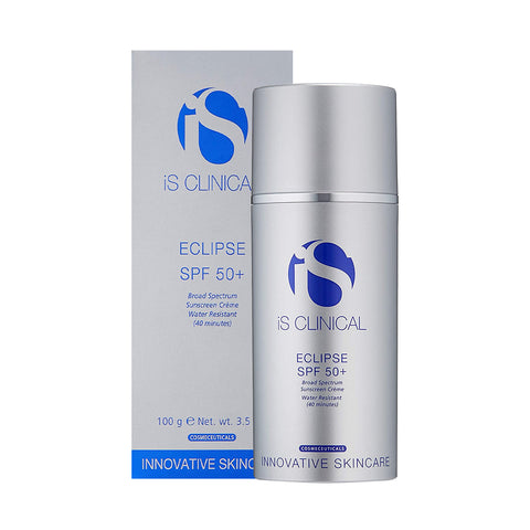 A sleek silver and blue bottle of iS Clinical Eclipse SPF 50+ sunscreen, with a net weight of 100g (3.5 oz), stands before its matching box, offering broad-spectrum UV protection and water resistance for up to 40 minutes.