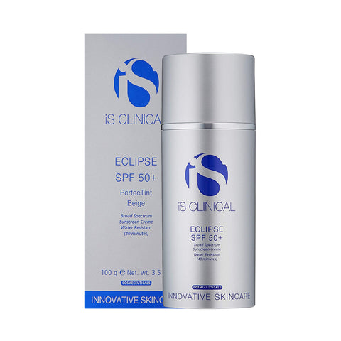 A silver bottle of iS Clinical Eclipse SPF 50+ Perfect Tint Beige (3.5oz, 100g) sunscreen sits beside its box, featuring a water-resistant formula effective for 40 minutes and broad-spectrum UVA/UVB protection with an ultra-sheer finish.