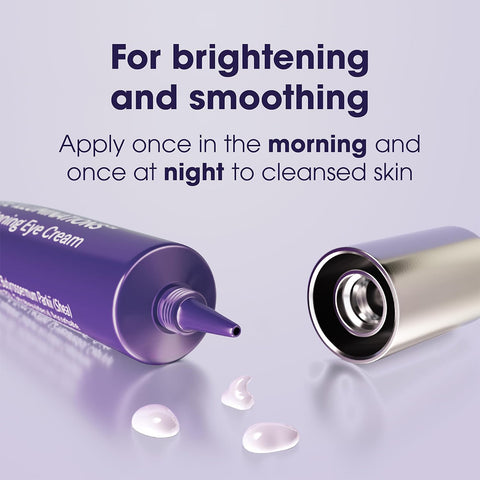 A purple tube of LUMIFY Eye Illuminations Hydra-Gel from Bausch + Lomb lies open, dispensing small dollops. Text reads: Clinically proven for brightening and smoothing under-eyes. Apply morning and night to cleansed skin.