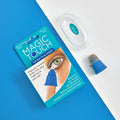 The Magic Touch Eye Drop Applicator is displayed on a blue and white background, featuring a sleek blue and beige design. It includes an antimicrobial agent for easy use and waste reduction, shown with its packaging in a convenient clear plastic case.