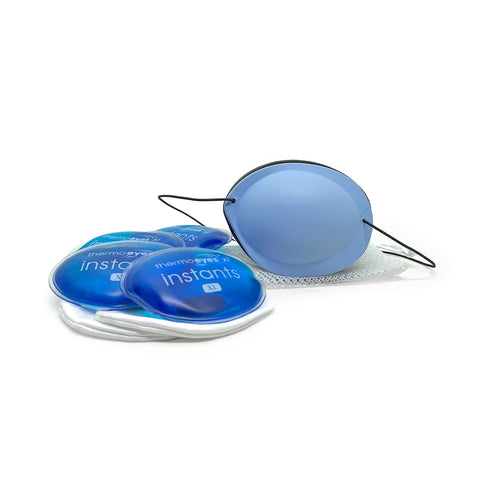 The EyeEco Eyelid Stye Kit (XL - Blue) by PRN includes a blue circular eye mask with black elastic straps, surrounded by four thermoeyes instants gel packs, all set on a white background. This advanced design ensures soothing eye relief and comfort, making it an ideal stye kit.