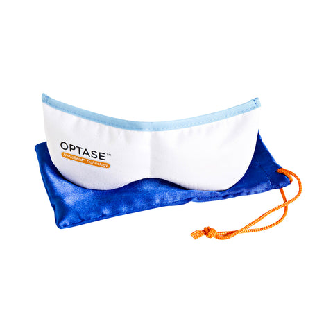 The Optase Moist Heat Dry Eye Mask, featuring ThermoBeads Technology and a light blue trim, provides dry eye relief through microwavable moist heat therapy. This reusable mask rests on a blue pouch with an orange drawstring and is labeled with OPTASE.