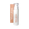 A 50mL white pump bottle of Merakim Facial Sunscreen SPF 50 sits in front of its peach box, showcasing minimalist light brown branding. Infused with zinc oxide, it offers broad-spectrum protection for sensitive skin.