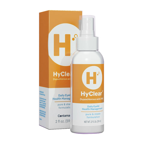 A white and orange box featuring a 60ml Hyclear Hypochlorous Spray from Contamac for daily eyelid hygiene. Labeled with 0.01% hypochlorous acid for antimicrobial activity, the bottle offers a 1-2 month supply and prominently displays HyClear.