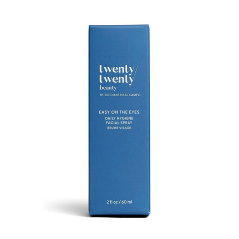 The Twenty Twenty Daily Hygiene Facial Spray by Dr. Diane Hilal-Campo, in a blue rectangular box, is ophthalmologist-approved and named Easy on the Eyes. This calming 2 fl oz (60 ml) face mist features soothing hypochlorous acid for essential skin refreshment.