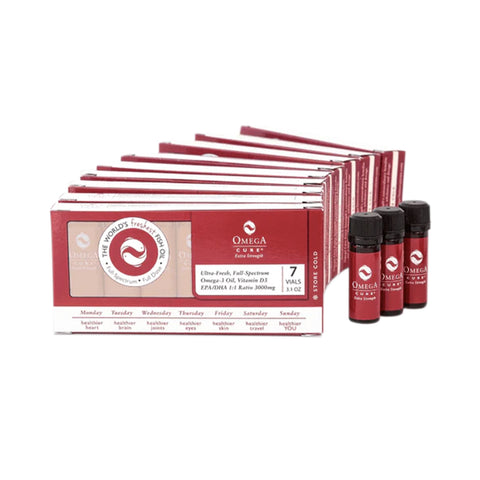 A display features red and white boxes of Omega Cure Extra Strength Pure Liquid Omega 3 Vials by Omega 3 Innovations, with three vials beside them. They showcase freshness and daily dosage, perfectly blending cod liver oil and Vitamin D3 for optimal health benefits. Cold shipping included.