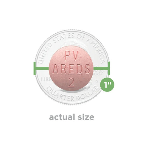 A pink PreserVision AREDS 2 Chewable Eye Vitamin & Mineral Supplement tablet by Bausch + Lomb, labeled PV AREDS 2, is displayed next to a U.S. quarter for size comparison of its 1-inch diameter. It supports eye health and may help manage symptoms of Age-related Macular Degeneration.