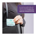 A person puts a MediViz Eyelid Cleansing Wipes (No Tea Tree Oil) packet into a black bag. Text highlights its daily benefits: removing dead skin cells, debris, and eye makeup to promote eye health and rejuvenate eyelid skin. Brand: PRN - Physician Recommended Nutriceuticals.