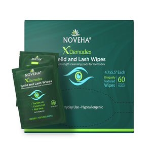 Image of a Noveha Anti-Demodex Eyelid & Lash Wipes (60ct) box with two individual packets resting against it. The green packaging emphasizes natural ingredients such as tea tree oil, coconut oil, aloe vera, and its hypoallergenic properties.